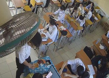 The girl in socks and heels shoeplay during class