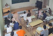 The teacher remove heels relax her tired feet under the desk 2