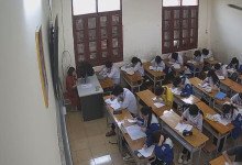 The teacher dangling shoeplay and dipping many times during class 32