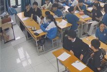 The teacher dangling shoeplay and dipping many times during class 38