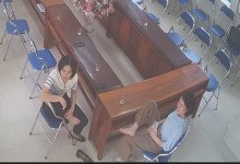 The teachers remove heels relax her tired feet after class