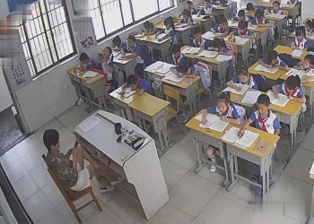 The primary school teacher relax her tired feet 6