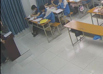 The teacher dangling shoeplay and dipping many times during class 52