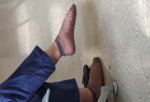 Lady dangling shoeplay when line up in the waiting hall 39