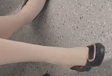 The lady in black heels dangling shoeplay when waiting for a call 19