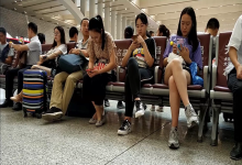 Girl relax her tired nylon feet when waiting for a train 3