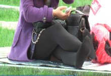 Black nylon feet on the grass