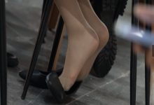 Group of hostess sit down relax their tired nylon feet 7