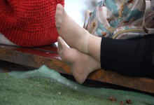 The lady remove shoes relax her tired dirty nylon feet 