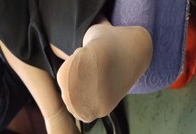 The lady remove shoes relax her tired feet when waitting for a train 43