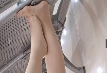 The lady relax her tired feet when line up in the waiting hall 103