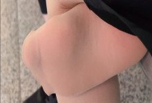 The lady remove shoes relax her tired feet when waitting for a train 65