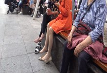 The middle-age lady relax her sexy tired feet on the chair 11