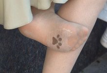 There's an embroidery of bear claws on her sole