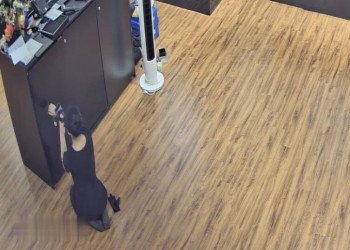 The jewelry store hostess in black nylon show us her cute feet! 246