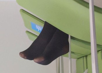 I could even smell the stench of her feet in black stockings.