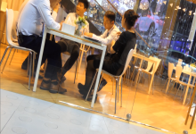 Through glass shot  a girl dipping and shoeplay when  sign a contract