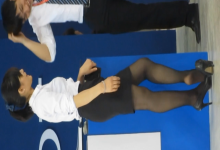 Girl in black nylon heels shoeplay for her co-worker 