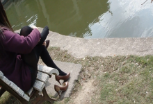 Lady relax by the pond her nylon feet very sexy