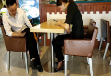 It's a great opportunity to watch lady's feet when her having lunch