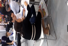 The hostess sit down dipping shoeplay under the table