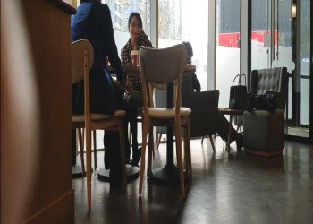 The lady in black nylon dangling shoeplay when having lunch 3