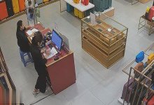 The bag shop hostess stand up dipping shoeplay behind the desk