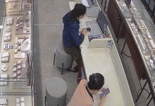 The jewelry store hostess bare feet dipping shoeplay under the table