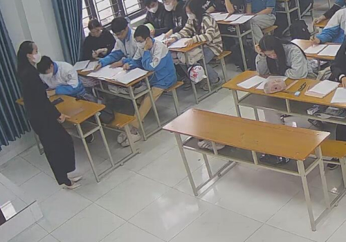 The teacher dangling shoeplay and dipping many times during class 51
