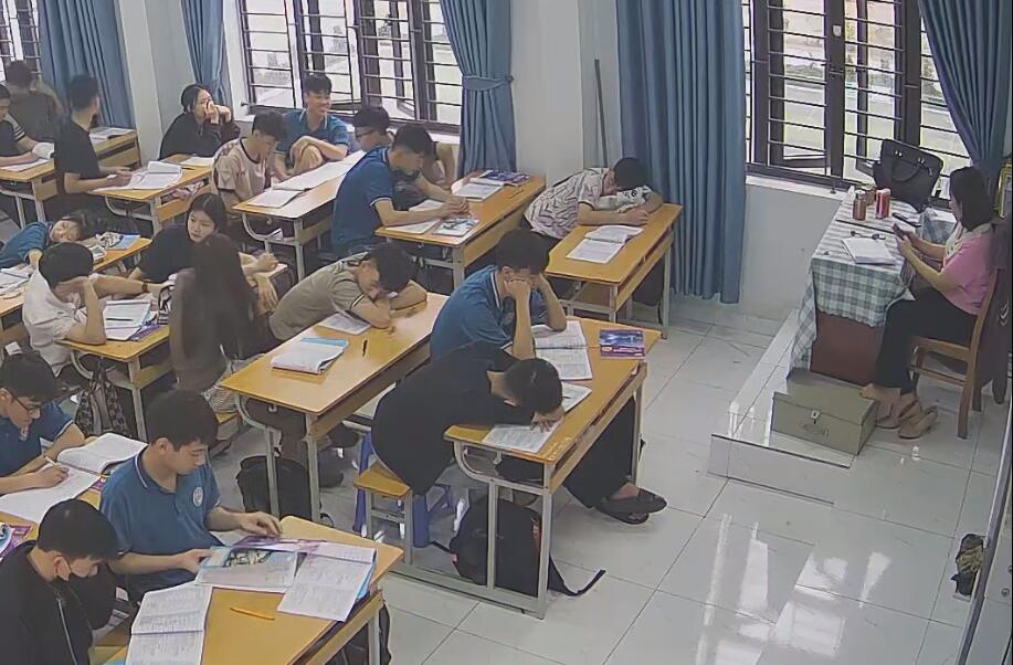 The teacher dangling shoeplay and dipping many times during class 10