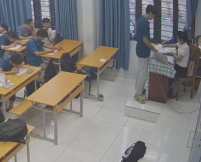 The teacher dangling shoeplay and dipping many times during class 48