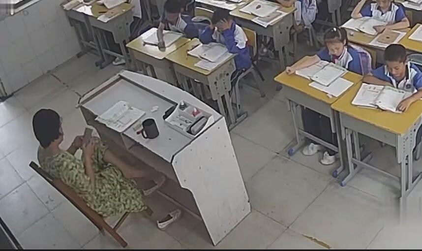 The primary school teacher relax her tired feet