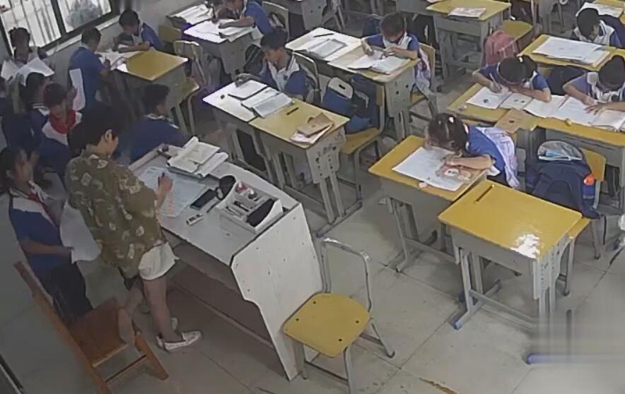 The primary school teacher relax her tired feet 3