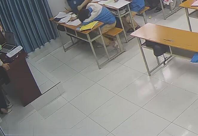 The teacher dangling shoeplay and dipping many times during class 63