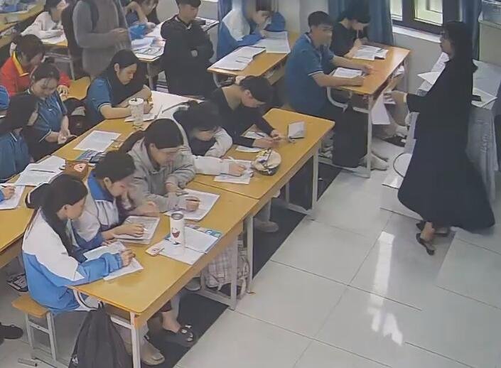 The teacher dangling shoeplay and dipping many times during class 64