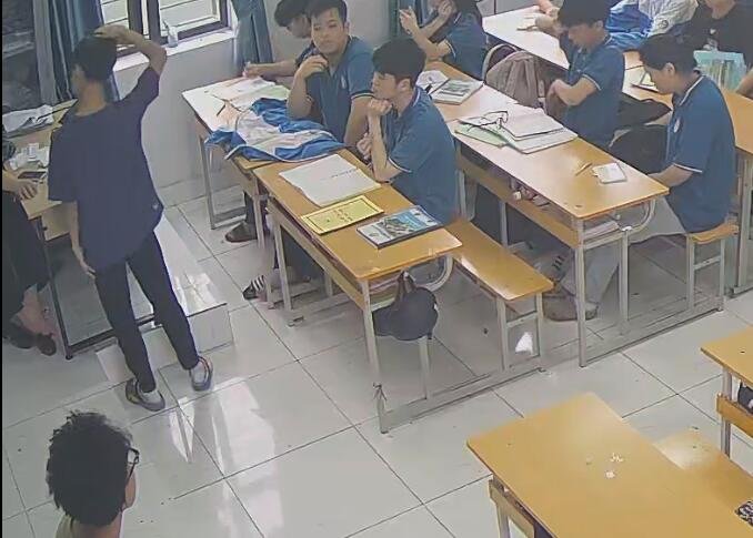 The teacher dangling shoeplay and dipping many times during class 67