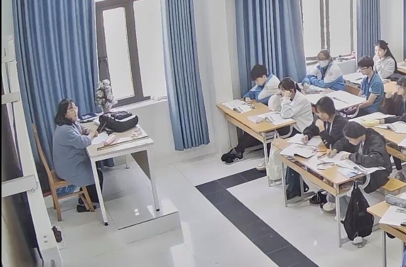 The voluptuous female teacher shoeplay under the table !