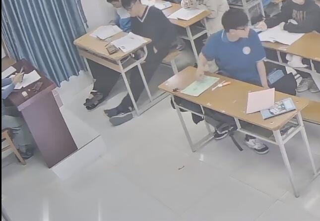 I saw her pull at the tip of her sock