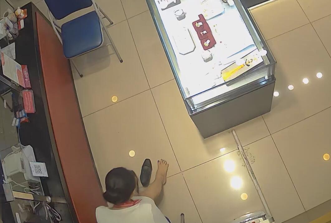 The jewelry store hostess in white dress great dangling shoeplay 40