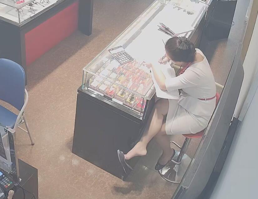 The jewelry store hostess in white dress great dangling shoeplay 10