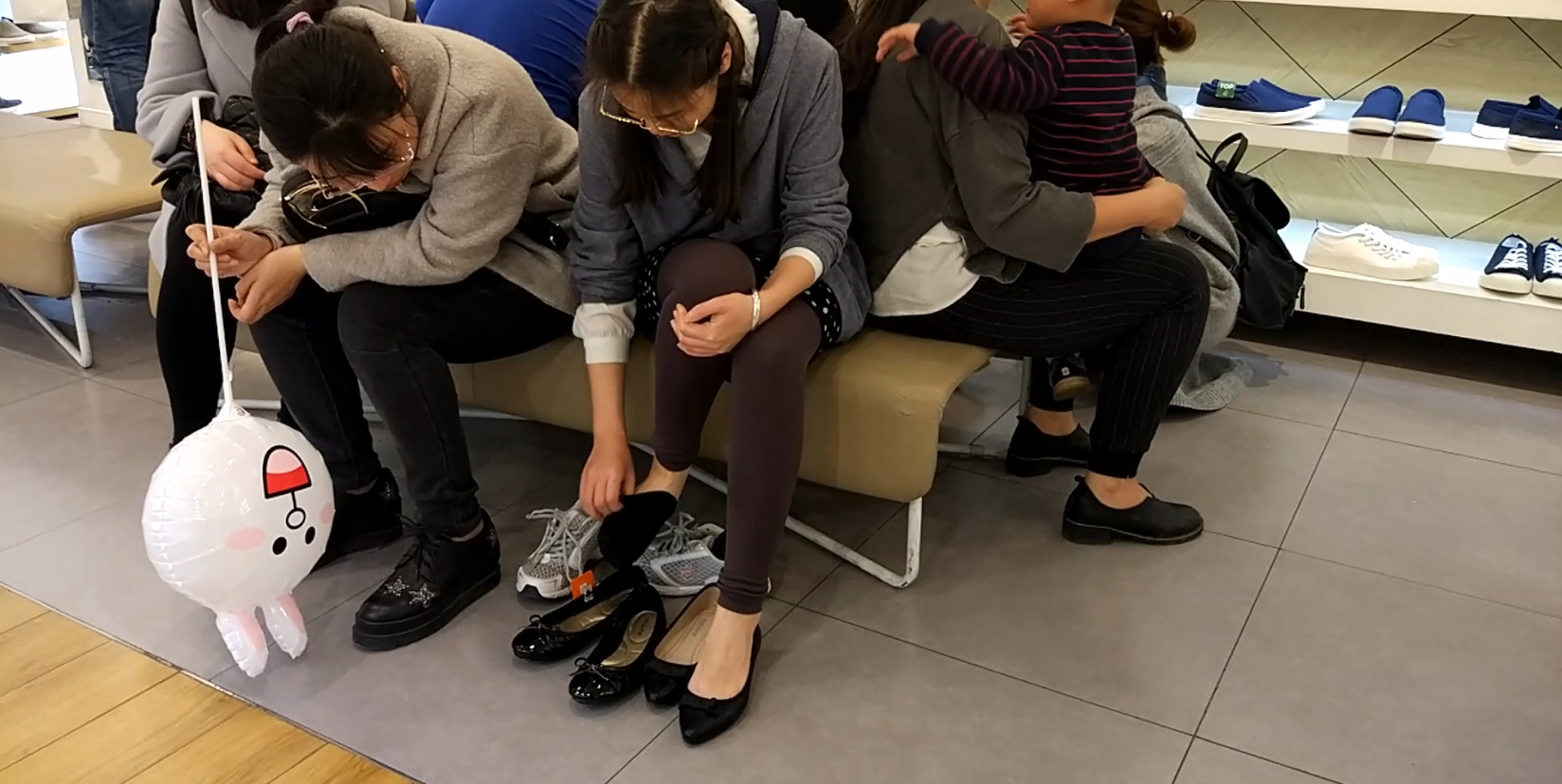 It&#039;s a great opportunity to watch lady&#039;s  feet as her buying shoes
