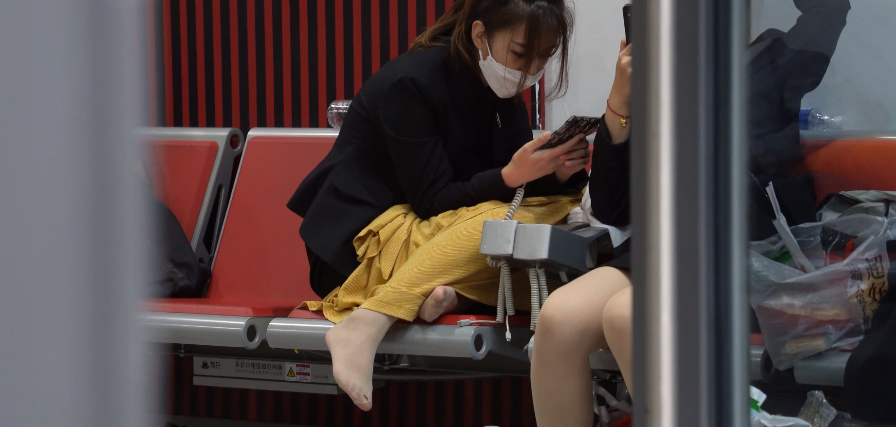 There are band-aids on her heels