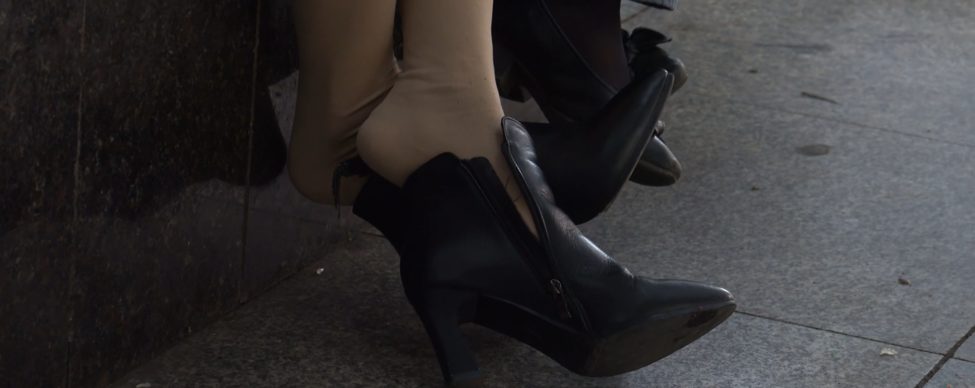The lady remove boots relax her tired feet