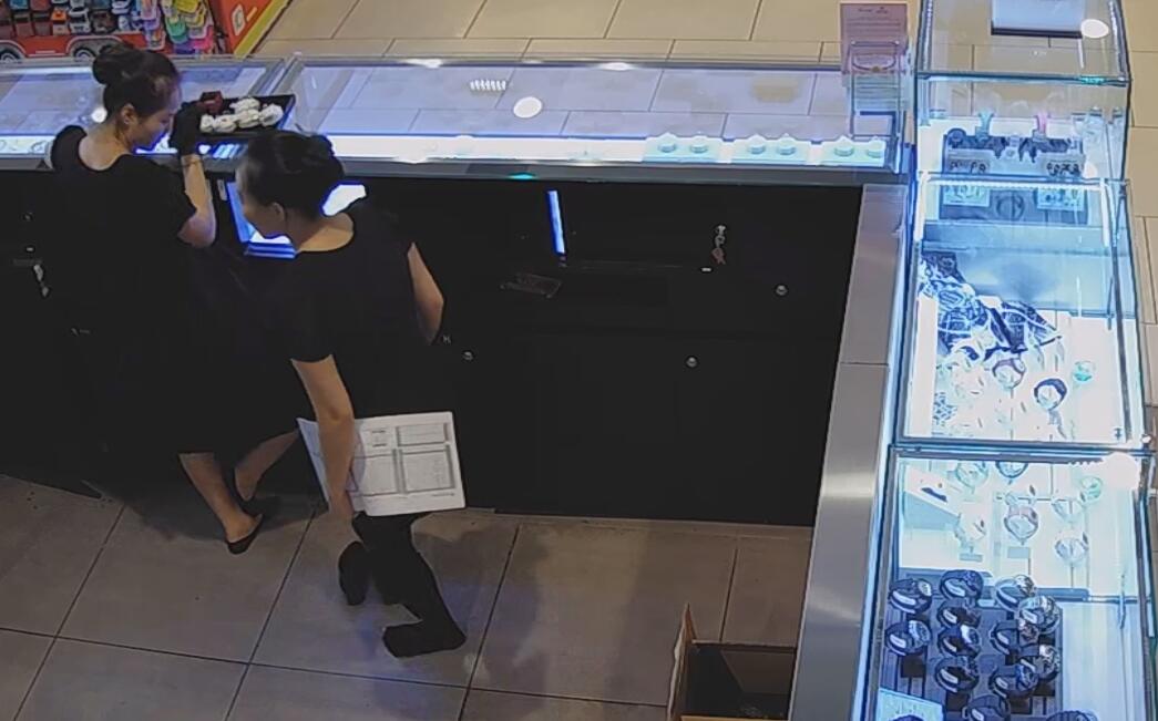 The jewelry store hostess in black nylon show us her cute feet! 104