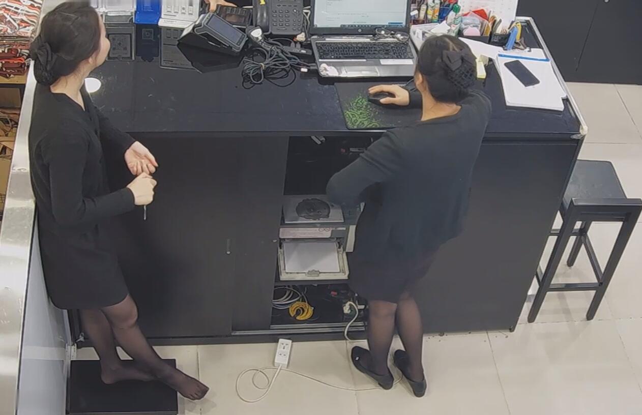 The jewelry store hostess in black nylon show us her cute feet! 111