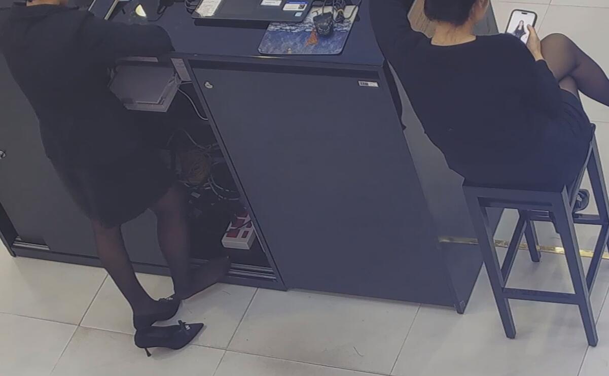 The jewelry store hostess in black nylon show us her cute feet! 112