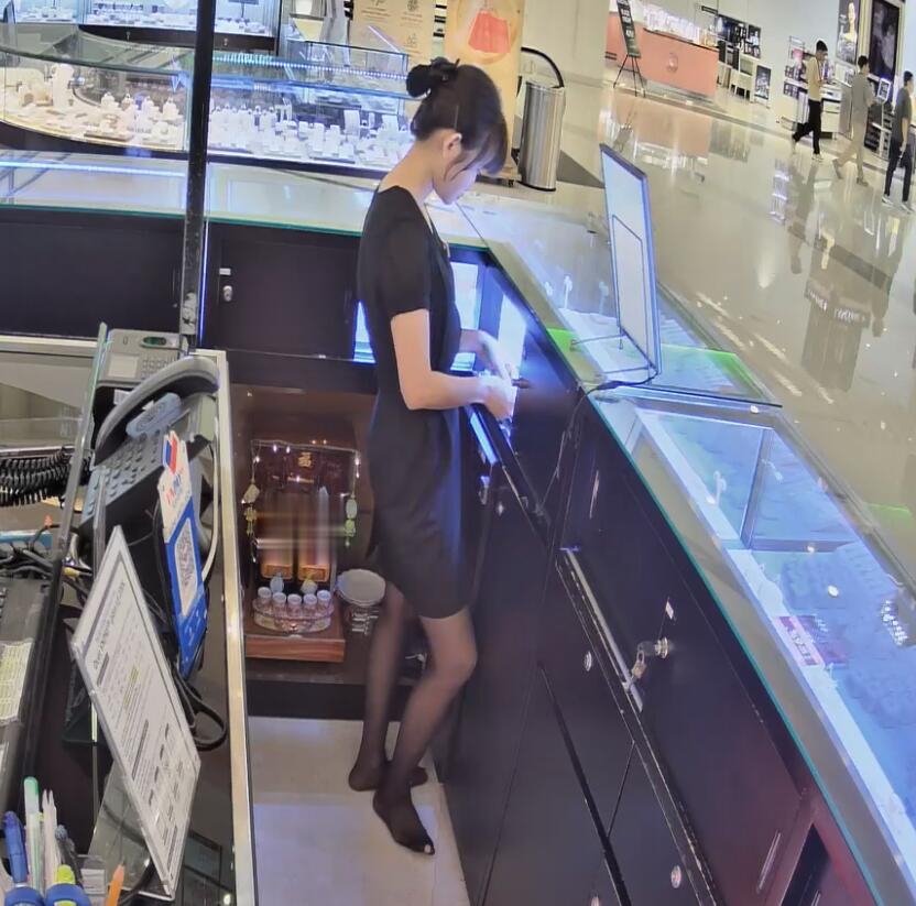 The jewelry store hostess in black nylon show us her cute feet! 119