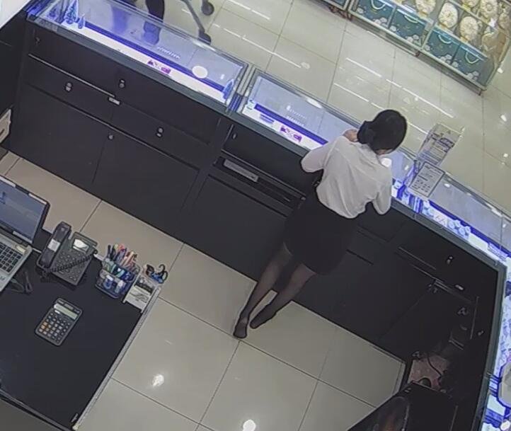 The jewelry store hostess in black nylon show us her cute feet! 205