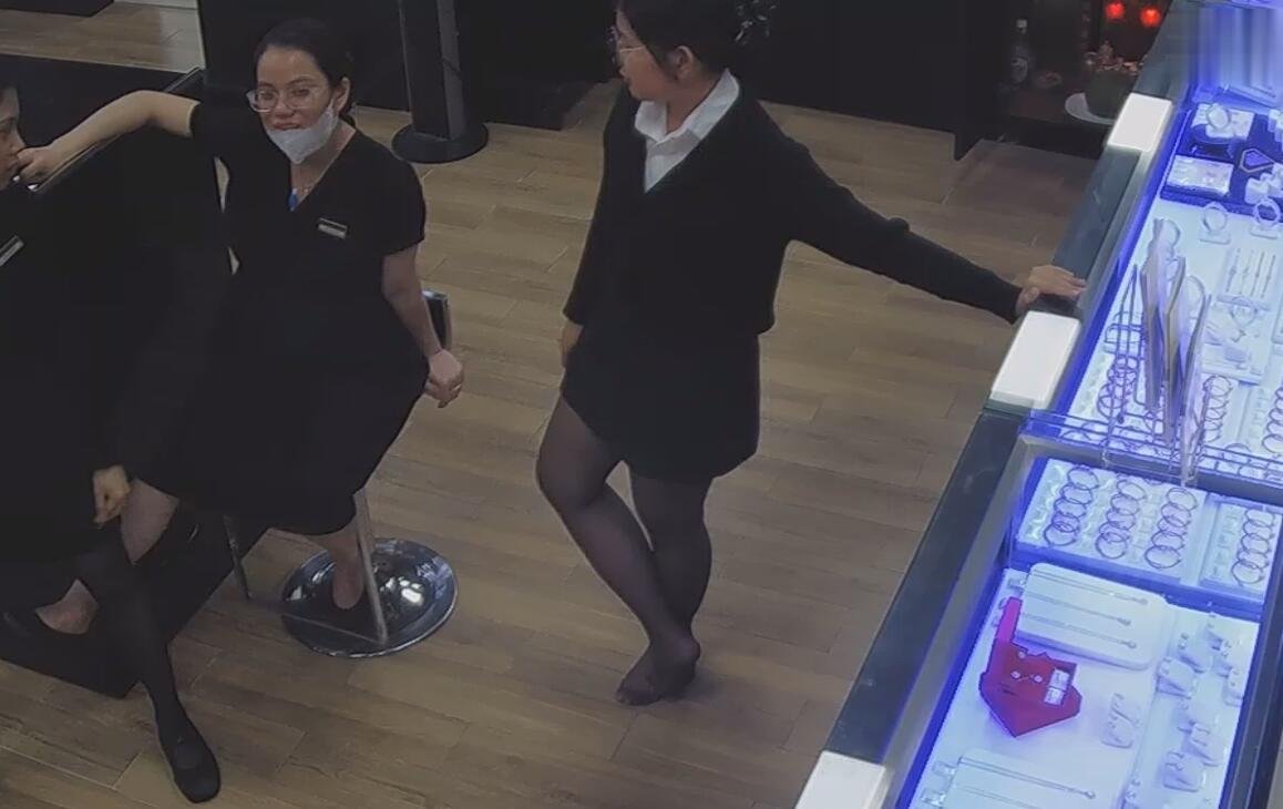 The jewelry store hostess in black nylon show us her cute feet! 218