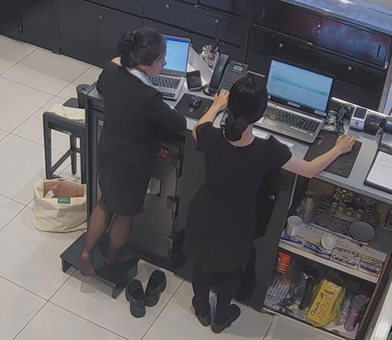 The jewelry store hostess in black nylon show us her cute feet! 237